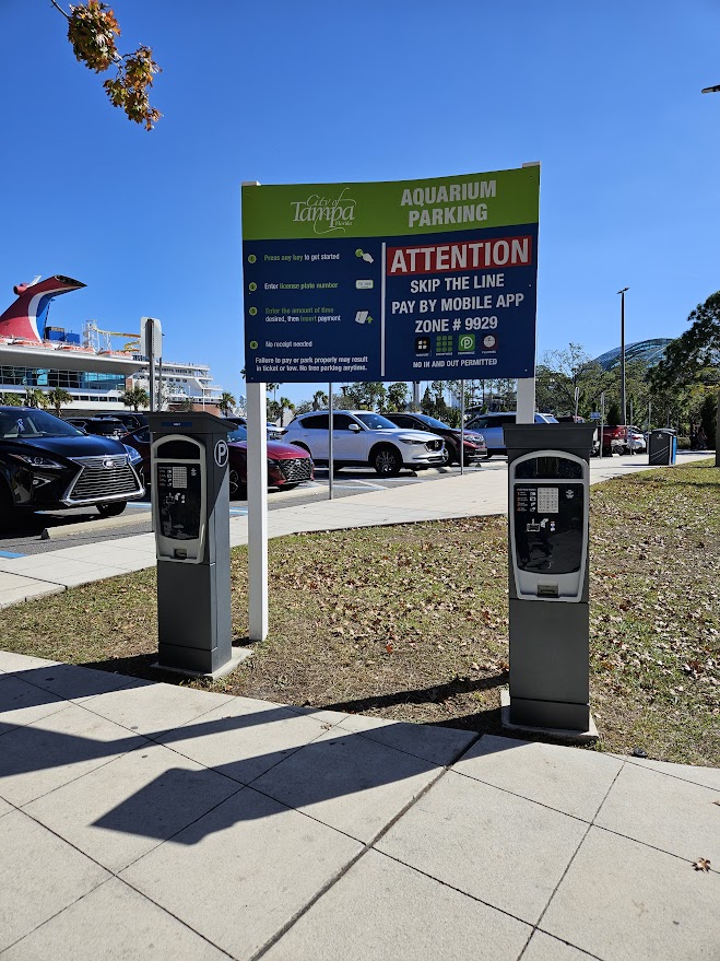 A photo of the City of Tampa Aquarium Parking pay machines.
